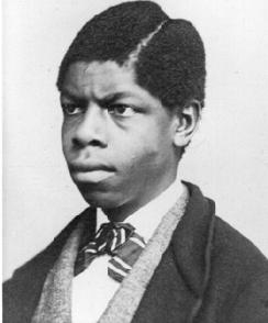 A black and white photo of a young Theophilus Thompson