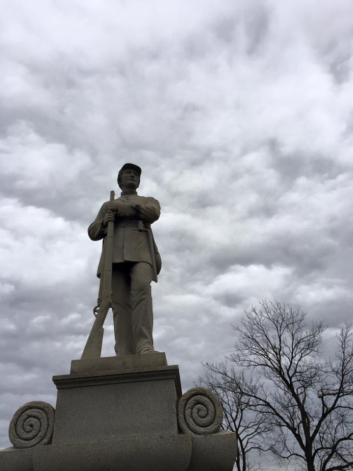 A silent soldier, cast in stone, overlooks Antietam Battlefield