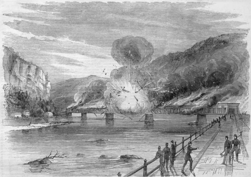 A black and white illustration of a railroad bridge being burned.