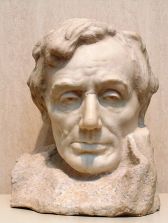 A view of the sculpture, a marble bust of Lincoln, from the front.