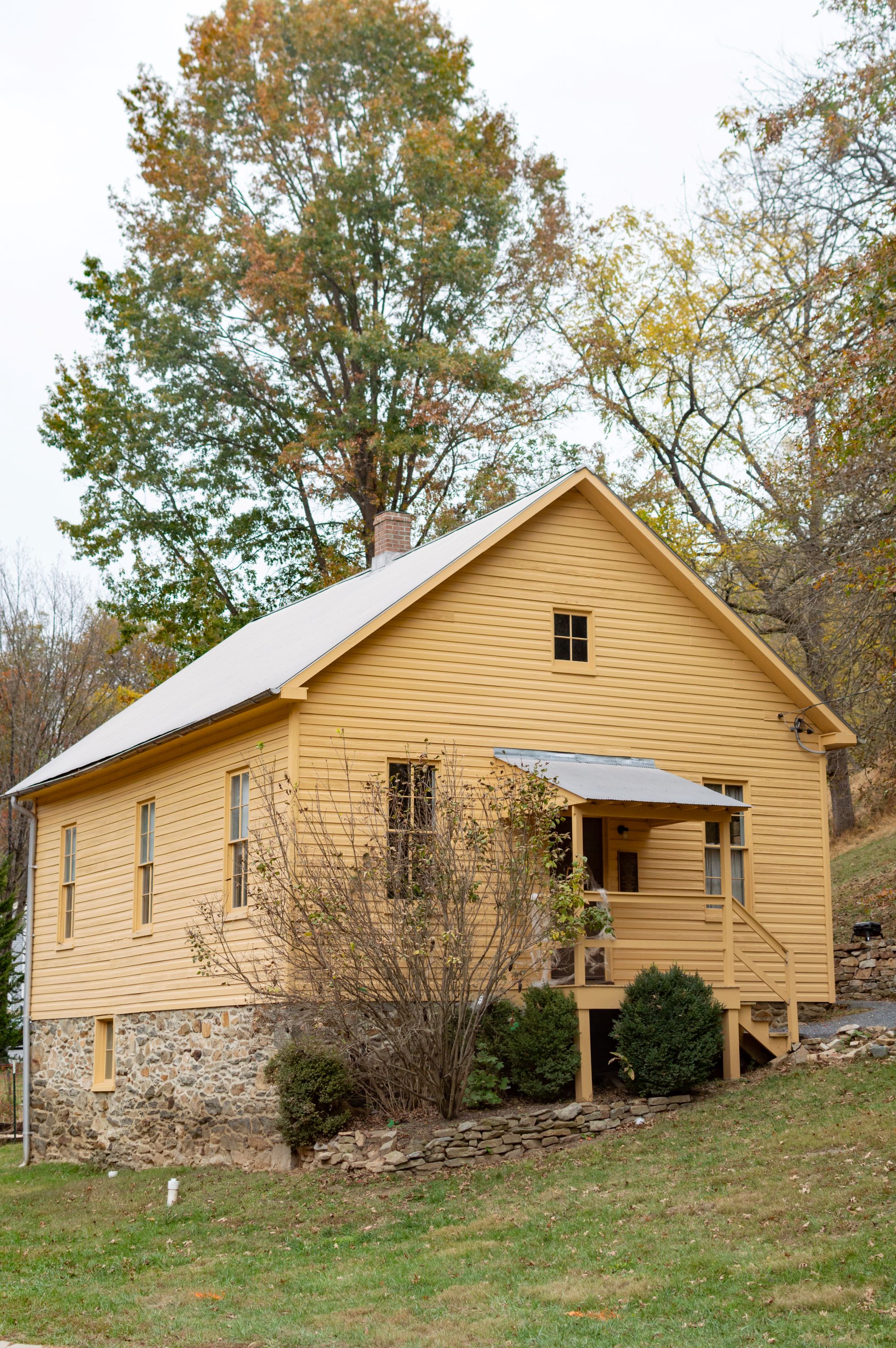 Historic Sykesville Colored Schoolhouse, an early 20th century building surrounded by trees