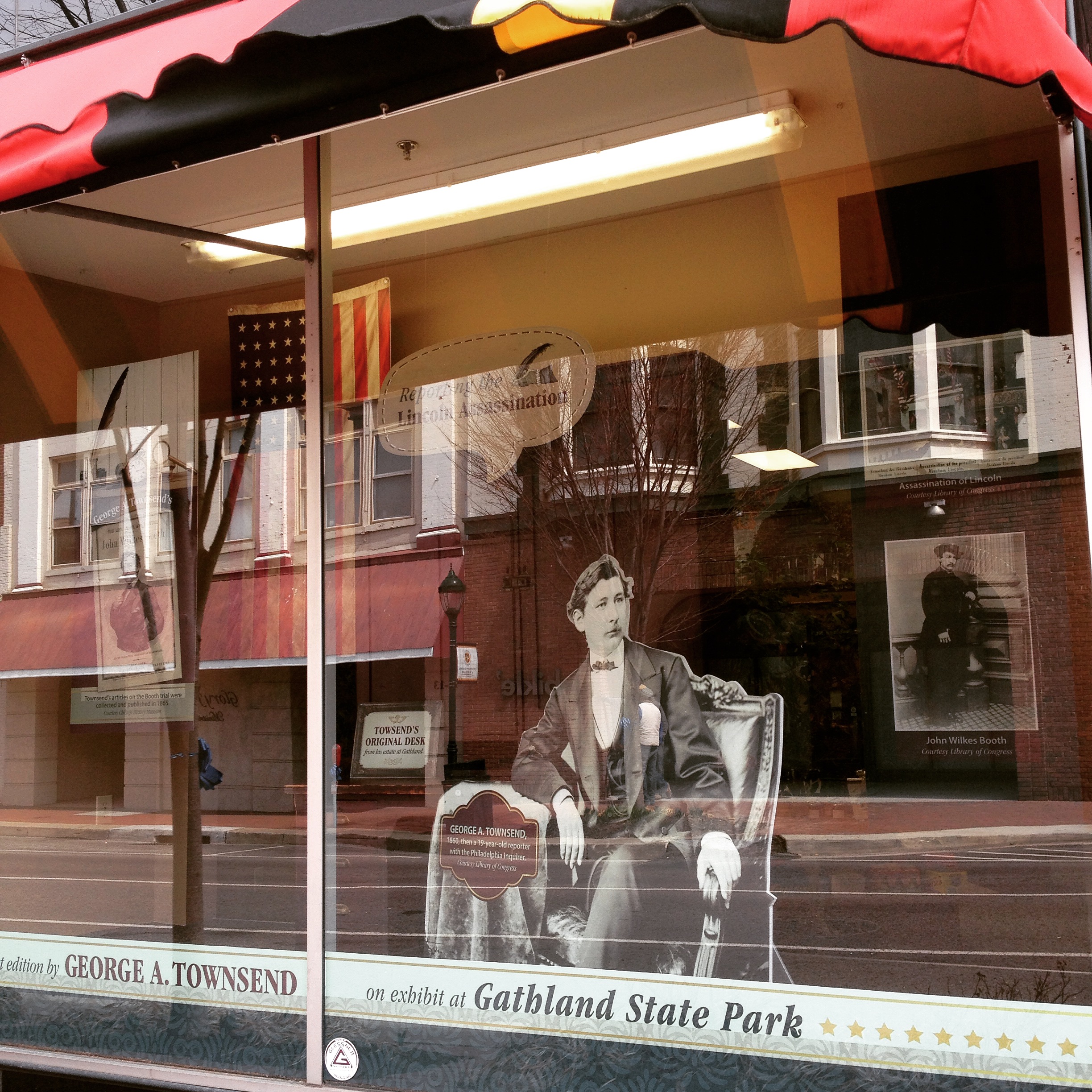 A lifesize cutout of George Alfred Townsend sits in the window of the Visitor Welcome Center in Hagerstown